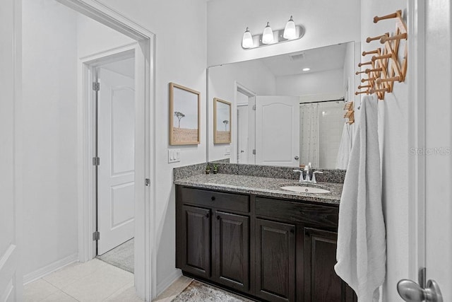 1193 Woods Landing Dr, Minneola, FL 34715 - bathroom featuring vanity, tile patterned floors, and a shower with curtain