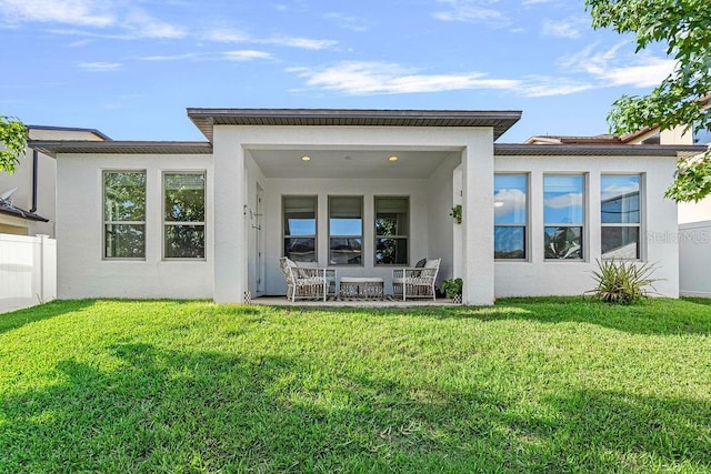 1193 Woods Landing Dr, Minneola, FL 34715 - back of house with stucco siding
