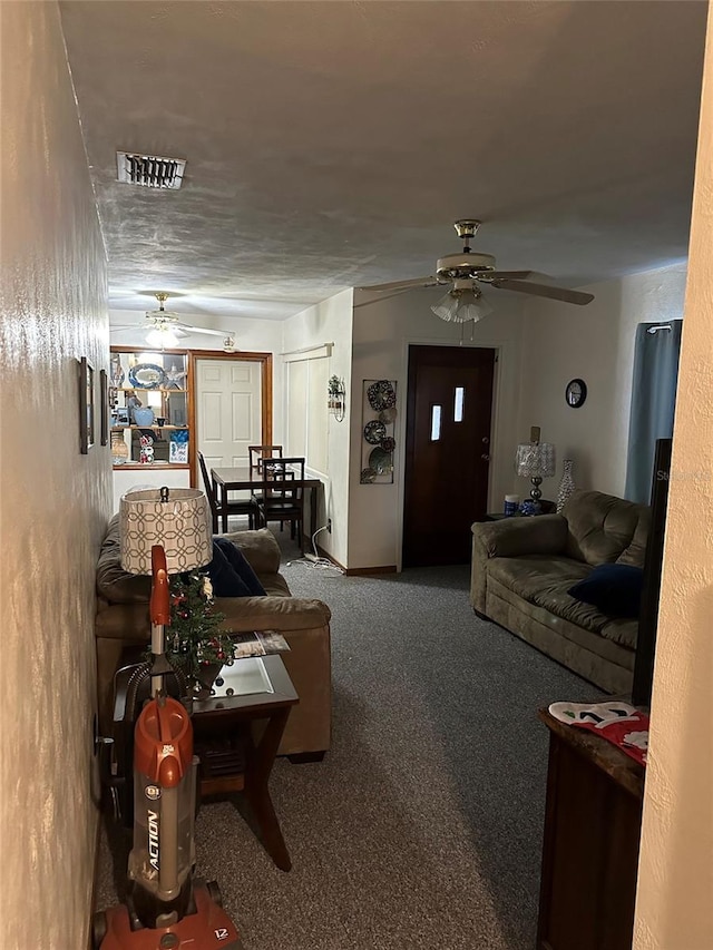 511 Pilaklakaha Ave, Auburndale, FL 33823 - living area with ceiling fan and carpet floors