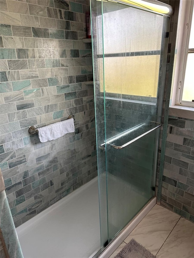 511 Pilaklakaha Ave, Auburndale, FL 33823 - full bath with a shower stall and marble finish floors