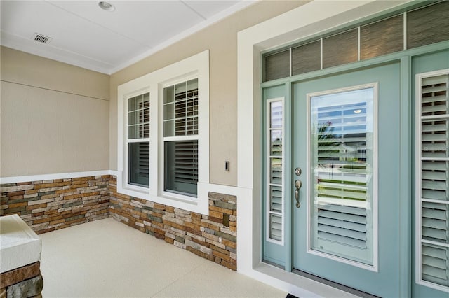16415 Good Hearth Blvd, Clermont, FL 34711 - view of exterior entry with a porch