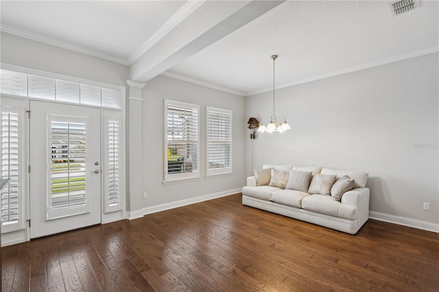 16415 Good Hearth Blvd, Clermont, FL 34711 - living area featuring a chandelier, crown molding, and dark wood-style flooring
