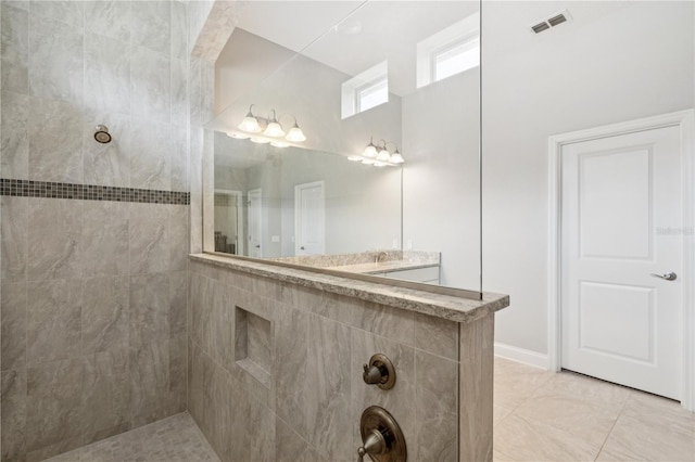 16415 Good Hearth Blvd, Clermont, FL 34711 - bathroom with walk in shower, vanity, and a high ceiling