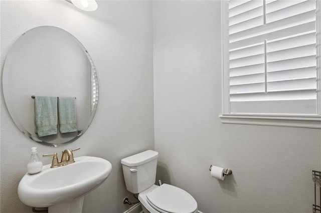 16415 Good Hearth Blvd, Clermont, FL 34711 - half bathroom featuring a sink and toilet