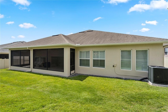16415 Good Hearth Blvd, Clermont, FL 34711 - rear view of property with a sunroom and a shingled roof