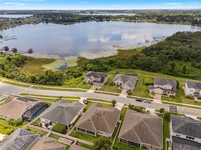 16415 Good Hearth Blvd, Clermont, FL 34711 - aerial view of residential area featuring a large body of water
