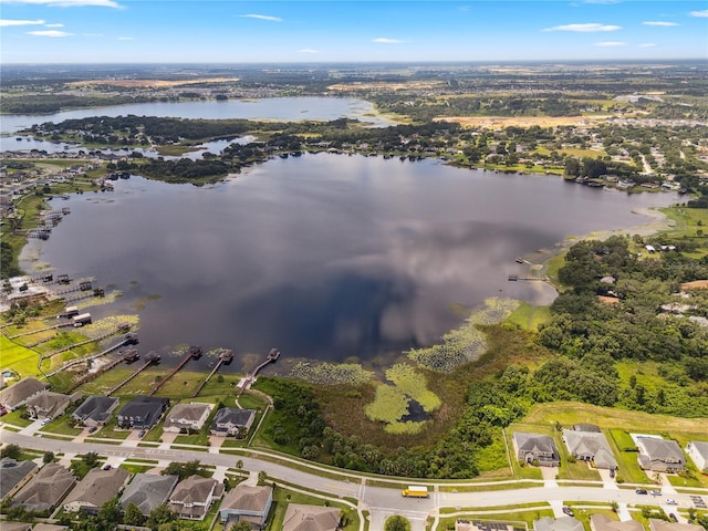 16415 Good Hearth Blvd, Clermont, FL 34711 - aerial view of property and surrounding area with a nearby body of water and nearby suburban area