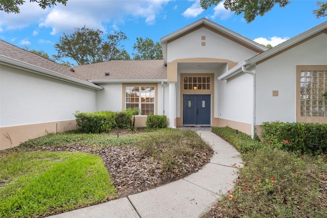 6029 Falconbridge Pl, Mount Dora, FL 32757 - entrance to property featuring stucco siding