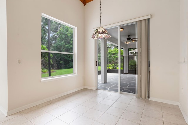 6029 Falconbridge Pl, Mount Dora, FL 32757 - spare room with light tile patterned floors and ceiling fan