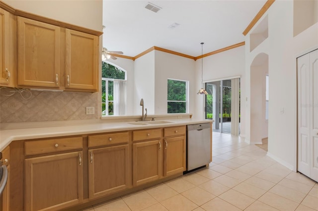 6029 Falconbridge Pl, Mount Dora, FL 32757 - kitchen featuring dishwasher, tasteful backsplash, light countertops, light tile patterned flooring, and ornamental molding
