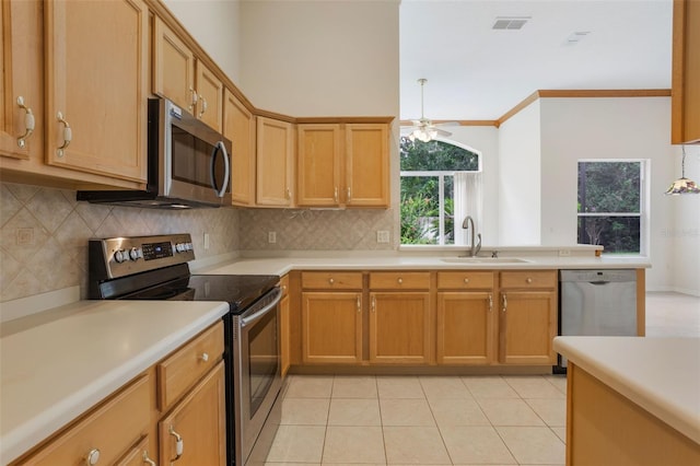 6029 Falconbridge Pl, Mount Dora, FL 32757 - kitchen with stainless steel appliances, tasteful backsplash, ceiling fan, light countertops, and light tile patterned floors