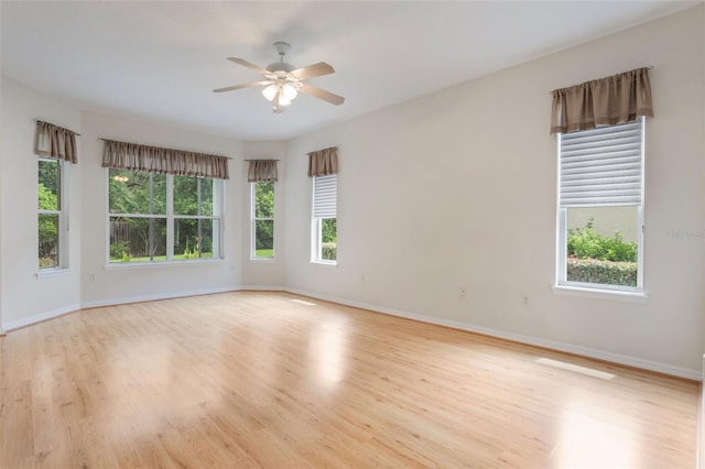 6029 Falconbridge Pl, Mount Dora, FL 32757 - spare room with light wood-style floors and a ceiling fan