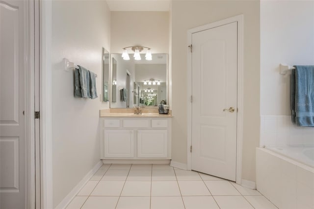 6029 Falconbridge Pl, Mount Dora, FL 32757 - bathroom with vanity, a garden tub, and tile patterned floors