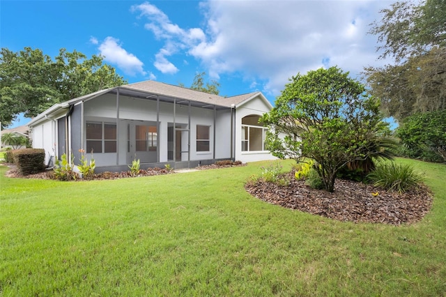 6029 Falconbridge Pl, Mount Dora, FL 32757 - back of house with a yard and a sunroom