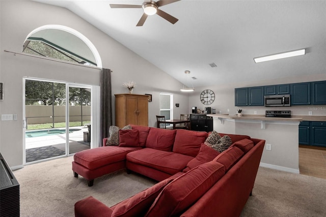 224 Highgate Park Blvd, Davenport, FL 33897 - living room featuring light colored carpet, a ceiling fan, and high vaulted ceiling