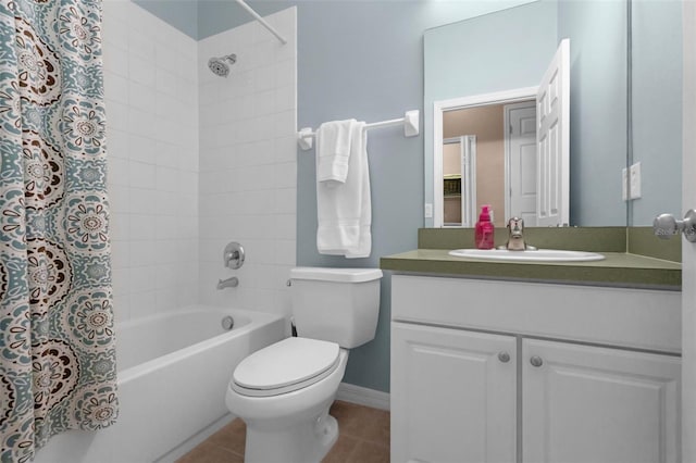 224 Highgate Park Blvd, Davenport, FL 33897 - full bathroom featuring shower / bath combo with shower curtain, vanity, and tile patterned flooring