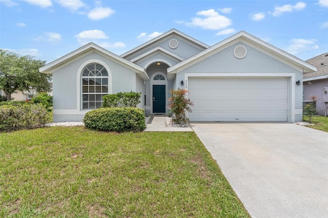 313 Cheshire Way, Davenport, FL 33897 - single story home with stucco siding, driveway, a garage, and a front lawn