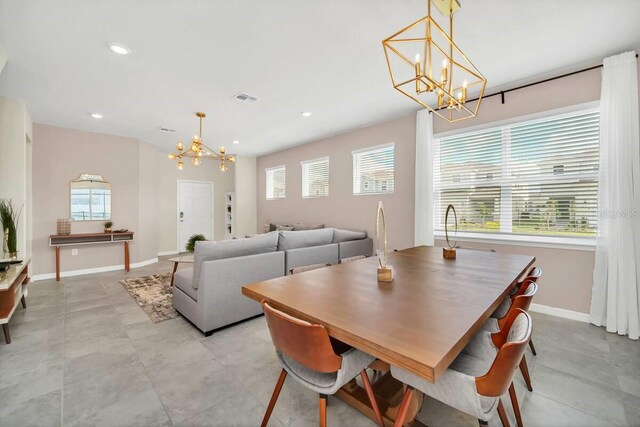3448 Lilac Way, Davenport, FL 33897 - dining area with a chandelier, plenty of natural light, and recessed lighting