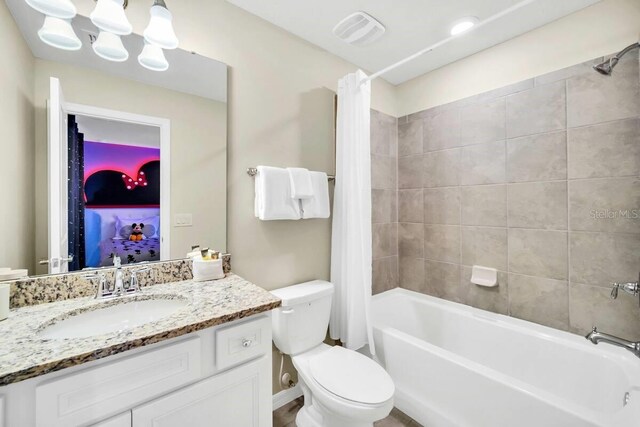 3448 Lilac Way, Davenport, FL 33897 - bathroom with shower / tub combo with curtain and vanity