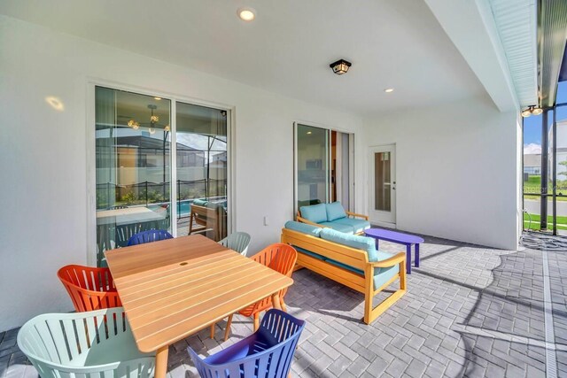 3448 Lilac Way, Davenport, FL 33897 - view of patio with an outdoor hangout area and outdoor dining space