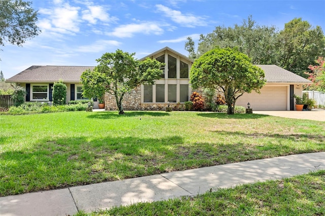 7905 Chad Ct, Orlando, FL 32835 - mid-century modern home with concrete driveway and an attached garage
