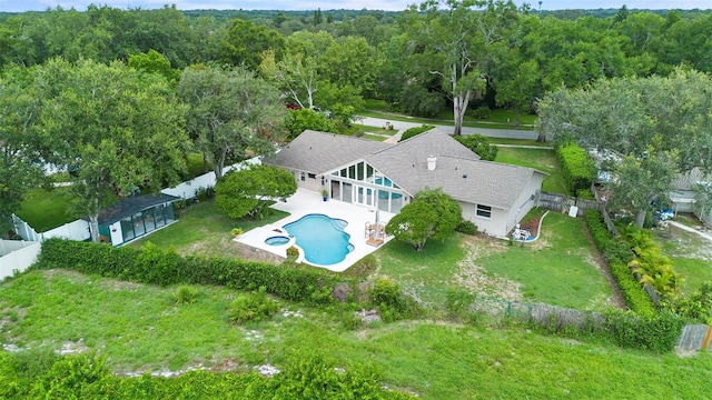 7905 Chad Ct, Orlando, FL 32835 - view of subject property featuring a pool area and a forest