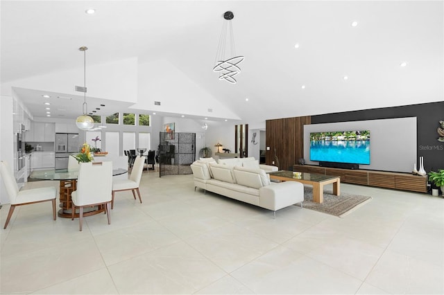 7905 Chad Ct, Orlando, FL 32835 - living area featuring high vaulted ceiling, light tile patterned floors, and recessed lighting