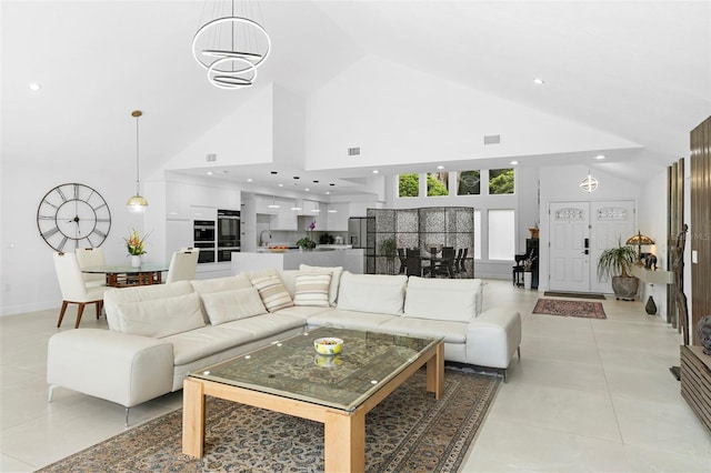 7905 Chad Ct, Orlando, FL 32835 - living area with high vaulted ceiling, light tile patterned floors, and recessed lighting