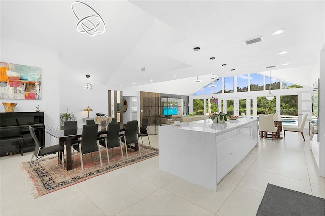 7905 Chad Ct, Orlando, FL 32835 - kitchen featuring modern cabinets, white cabinets, recessed lighting, a large island, and wall oven