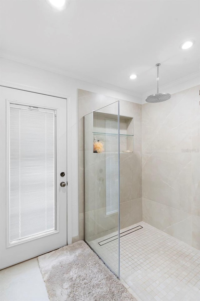 7905 Chad Ct, Orlando, FL 32835 - full bathroom with tiled shower, recessed lighting, and crown molding