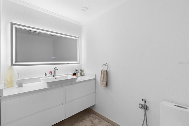 7905 Chad Ct, Orlando, FL 32835 - bathroom featuring vanity and crown molding