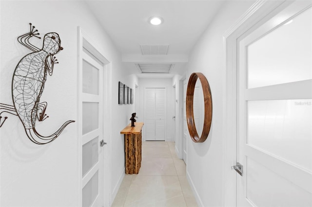 7905 Chad Ct, Orlando, FL 32835 - hall with light tile patterned flooring and baseboards