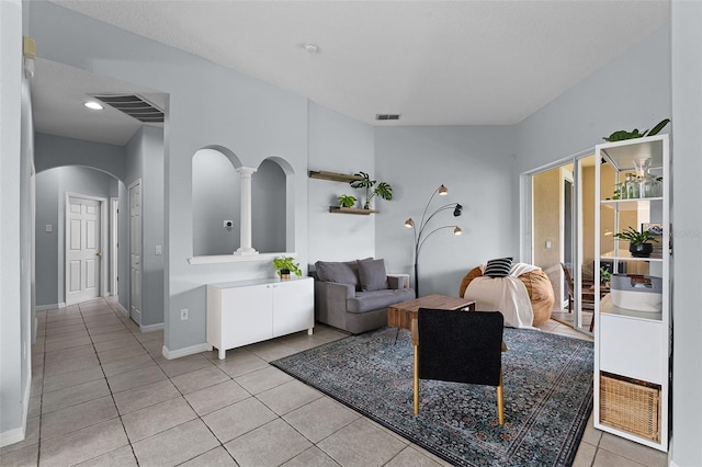 11337 Via Andiamo, Windermere, FL 34786 - living room with arched walkways and light tile patterned flooring
