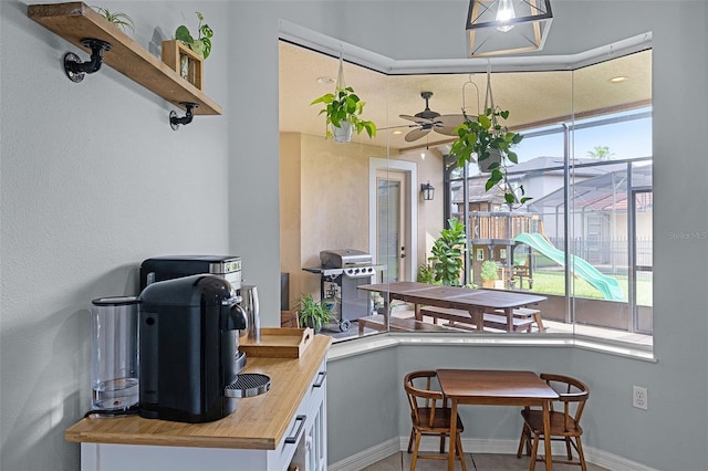 11337 Via Andiamo, Windermere, FL 34786 - dining room with plenty of natural light and a ceiling fan