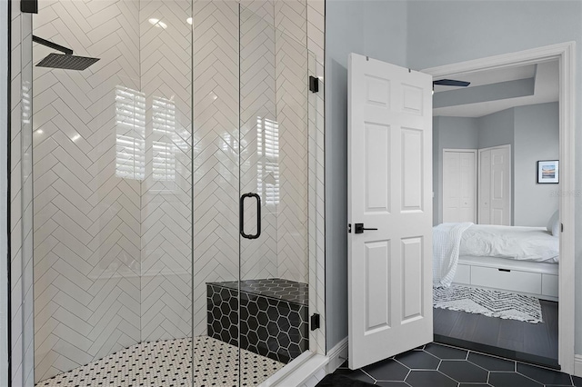 11337 Via Andiamo, Windermere, FL 34786 - ensuite bathroom with tile patterned flooring and a stall shower