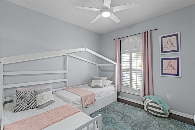 11337 Via Andiamo, Windermere, FL 34786 - bedroom featuring a textured ceiling and a ceiling fan