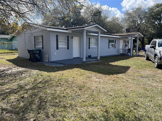767 Willie Mays Pkwy, Orlando, FL 32811 - view of front of home featuring a front lawn and stucco siding