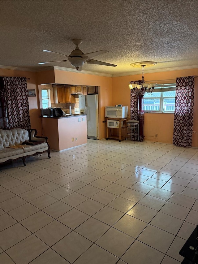 5300 Washington St Unit 340P, Hollywood, FL 33021 - living room with light tile patterned floors, crown molding, a textured ceiling, a chandelier, and ceiling fan