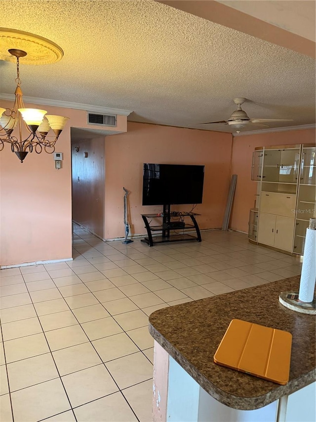 5300 Washington St Unit 340P, Hollywood, FL 33021 - unfurnished living room with a textured ceiling, a chandelier, ornamental molding, and light tile patterned floors