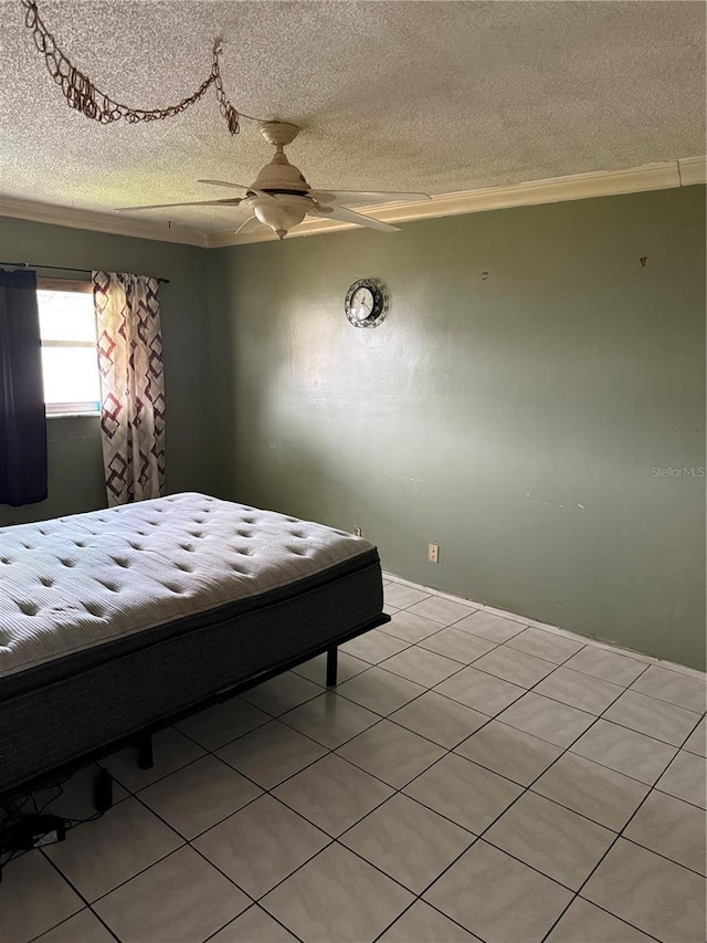5300 Washington St Unit 340P, Hollywood, FL 33021 - bedroom with a textured ceiling, light tile patterned floors, ceiling fan, and ornamental molding