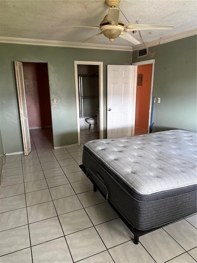 5300 Washington St Unit 340P, Hollywood, FL 33021 - bedroom featuring ornamental molding, light tile patterned flooring, a textured ceiling, and ceiling fan