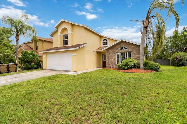 2979 Viscount Cir, Kissimmee, FL 34747 - view of front of home with stucco siding, a garage, concrete driveway, and a front yard