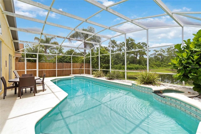 2979 Viscount Cir, Kissimmee, FL 34747 - view of swimming pool featuring a fenced backyard, a patio, and a lanai