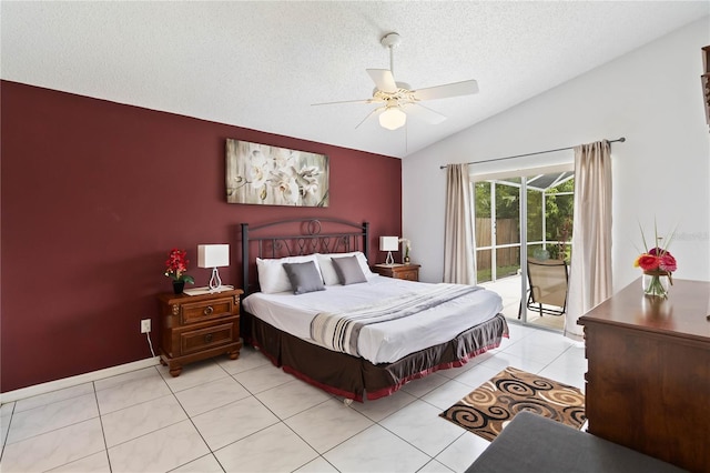 2979 Viscount Cir, Kissimmee, FL 34747 - bedroom featuring access to exterior, a textured ceiling, lofted ceiling, light tile patterned flooring, and a ceiling fan