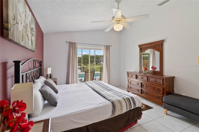 2979 Viscount Cir, Kissimmee, FL 34747 - bedroom featuring lofted ceiling, access to exterior, a textured ceiling, light tile patterned floors, and ceiling fan
