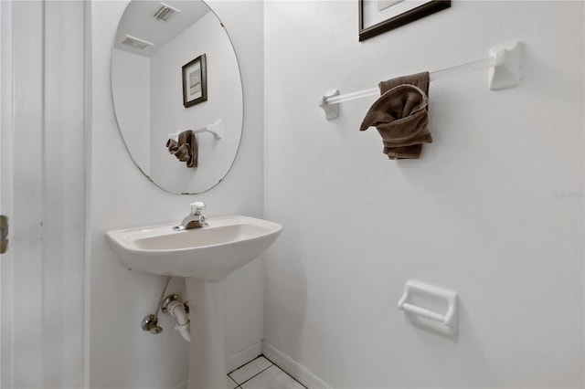 2979 Viscount Cir, Kissimmee, FL 34747 - bathroom with tile patterned floors and baseboards