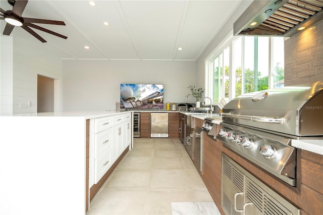 2813 Sanctuary Dr, Clermont, FL 34714 - kitchen featuring range hood, refrigerator, recessed lighting, light countertops, and light tile patterned flooring