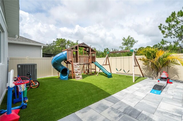 2813 Sanctuary Dr, Clermont, FL 34714 - view of jungle gym featuring a fenced backyard and a patio