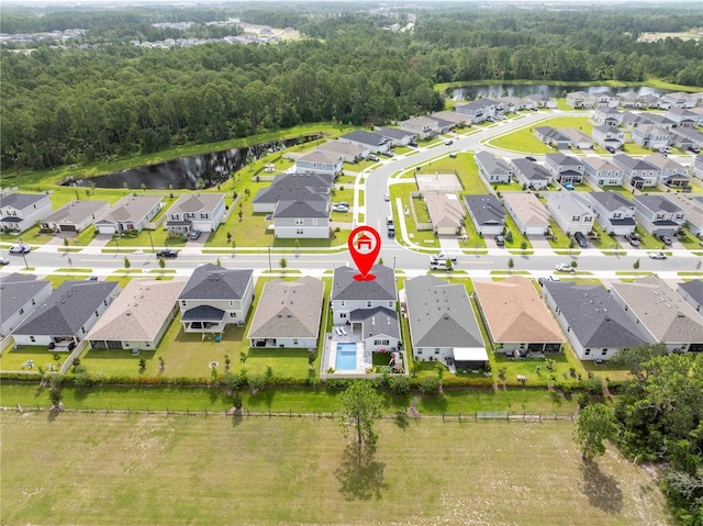 2813 Sanctuary Dr, Clermont, FL 34714 - aerial perspective of suburban area with a nearby body of water