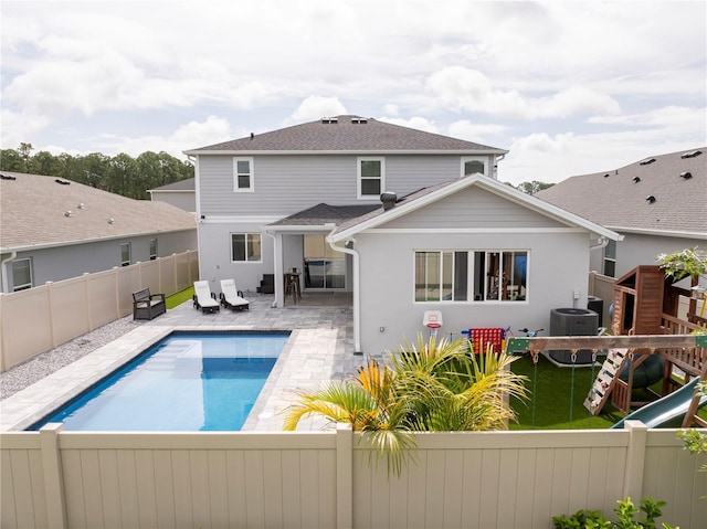 2813 Sanctuary Dr, Clermont, FL 34714 - view of swimming pool featuring a fenced backyard and a patio